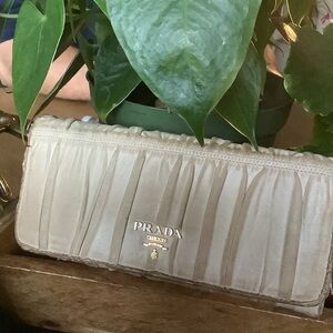 Authentic Prada Cream leather with Gold Logo